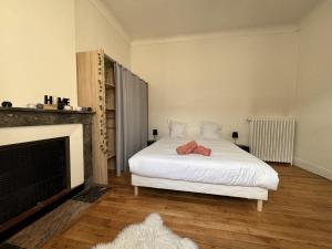 Appartements The Central-- Circuit - Ecommoy - 2 personnes - Reve au Mans : photos des chambres