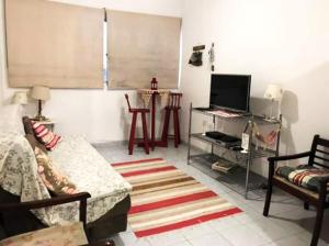 Apartamento a beira-mar com WiFi em Santos SP