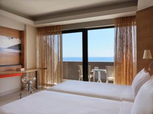 Double or Twin Room with Premium Front Sea View room in Esperos Mare Resort