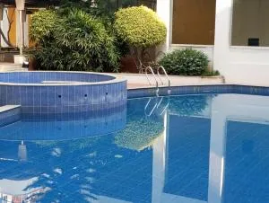 Amazistay offers Posh room for two with private balcony & bathroom & TV, Traveller, with shared Jacuzzi paid access near Brigade Senate - Yesvantpur