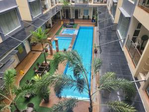 Sheryll Escapes - 203 La Grande, classy studio with hotel amenities!