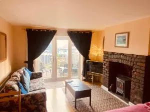 Ground Floor - view of Lighthouse, Garden and Parking - Sketty