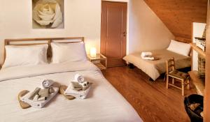 Triple Room-Attic room in Guesthouse Italiano