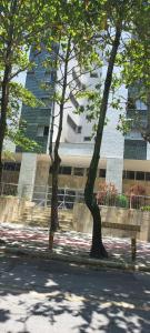 Apartamento com 4 quatros em frente a praia em Pitangueiras - Guarujá