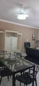 Apartamento com 4 quatros em frente a praia em Pitangueiras - Guarujá