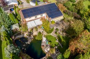 Glückliche Kuh-Villa - Achtsamer Rückzugsort mit Traumgarten, Schwimmteich & Raum zum Sein bis 18 Personen - Allgäu