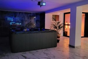 Appartements A O G prestige Relax Max SPA SAUNA : photos des chambres