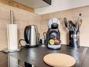 Appartements Le Wilson Cosy : photos des chambres