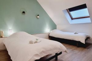Appartements *l'Oasis du Coeur de Ville*Spacieux et moderne : photos des chambres
