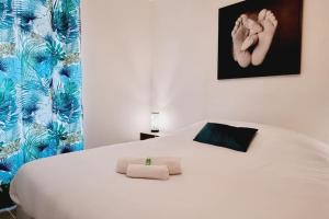 Appartements *l'Oasis du Coeur de Ville*Spacieux et moderne : photos des chambres