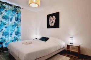 Appartements *l'Oasis du Coeur de Ville*Spacieux et moderne : photos des chambres