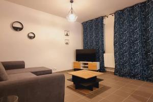 Appartements *l'Oasis du Coeur de Ville*Spacieux et moderne : photos des chambres