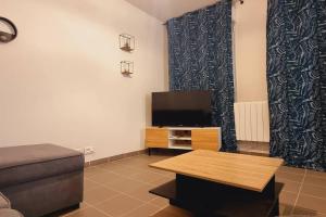 Appartements *l'Oasis du Coeur de Ville*Spacieux et moderne : photos des chambres