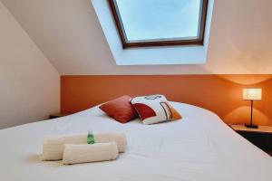 Appartements *l'Oasis du Coeur de Ville*Spacieux et moderne : photos des chambres