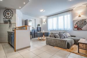 Appartements L'Evasion - Sauna Jacuzzi Cinema : photos des chambres