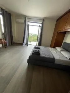 Palm Villa Balcony Room - Phrenaros