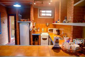 Otima casa c Wi Fi 8 min da praia Barequecaba SP