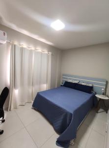 Apartamento no centro, ar-condicionado e garagem