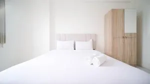 Best Choice 2BR at Puncak Dharmahusada Apartment Surabaya By Travelio - Gebangoutih