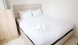 Best Choice 2BR at Puncak Permai Apartment Surabaya By Travelio - Gresik