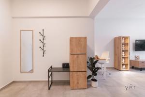 Modern Mythic Flat with Greek-Inspired Artistic