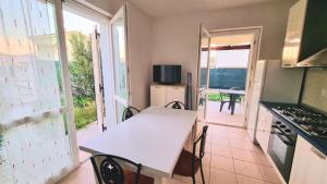 Appartamenti Mac, trilocali vicino al mare con posto auto