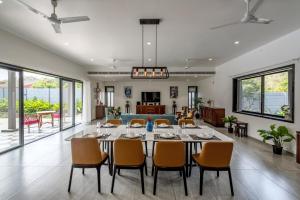 SaffronStays Mayfair Gardens - 4BR pet-friendly pool villa with patio, den, board games & modern interiors near jetty