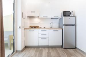 Appartamento Monolocale con 1 Letto Matrimoniale