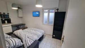 Appartements Studio Charmant - 3 min de DISNEYLAND : photos des chambres