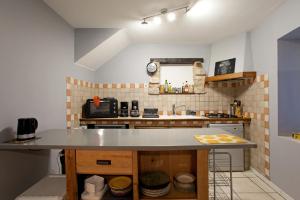 Maisons de vacances Gite urbain les jardins de la meyne : photos des chambres