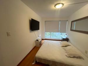 Depa en Bosques de las Lomas con lindo jardin