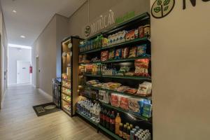 Flat surpreendente 4 pessoas em condomínio moderno 02 suites climatizados