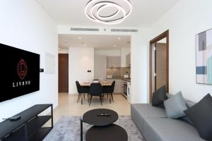 Livbnb Suites - Cozy 1BR + 1 in Sobha Hartland