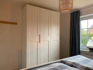 Nessmersiel, Renovierte Erdgeschosswohnung mit Garten, in Deichnähe, Wallbox,