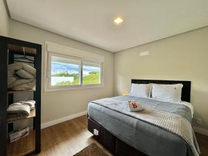 Delle Alpi 317 - Junto a Nasa e roda-gigante