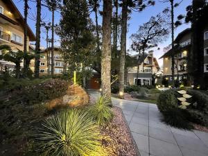 Casa de Pedra 303A - 2 suítes com piscina Gramado