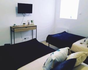 Appartements Appartement Le Moderne Ideal pour Couples et Professionnels : photos des chambres