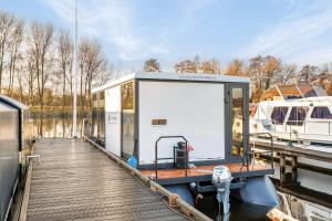 Charming Tiny Houseboat Escape Near Amsterdam by Weltevreden Experience