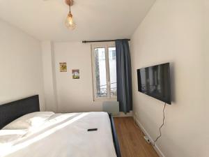 Appartements 2 pieces pres du Stade de France (Metro 13) : photos des chambres