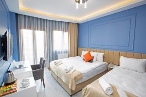 Triple Room with Balcony room in Taksim Leon’s Hotel