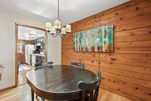 Picturesque Riverside Cabin with Fireplace and Porch