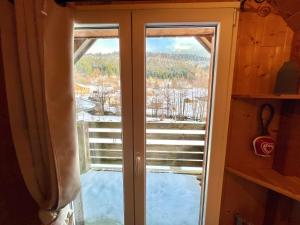 Appartements La perle Bressaude avec balcon et magnifique vue : photos des chambres