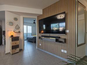 Appartements Pearl Beach - Rooftop Pool Seaside : photos des chambres
