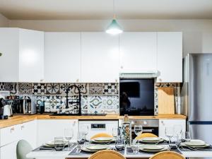 Appartements OASIS - 10 min from Disney, Free Parking, Self-Checkin : photos des chambres