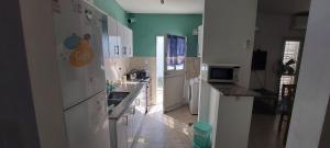 CASA CON PILETA Y COCHERa