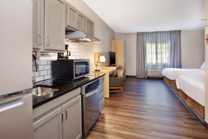 Studio Queen Suite with Two Queen Beds and Mobility Accessible Transfer Shower room in Candlewood Suites Kenosha an IHG Hotel