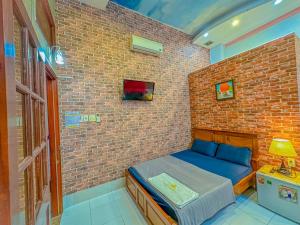 Phòng 4 Người Hạng Tiết Kiệm Với Phòng Tắm Chung (Economy Quadruple Room with Shared Bathroom)