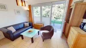 Feriendorf Südstrand Haus 21 - Rettin