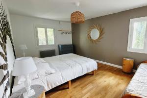Villas Maison Pierres Bois Feuilles : photos des chambres