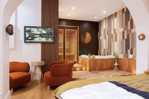 Appartements La suite du 21 - jacuzzi - sauna - centre ville : photos des chambres
